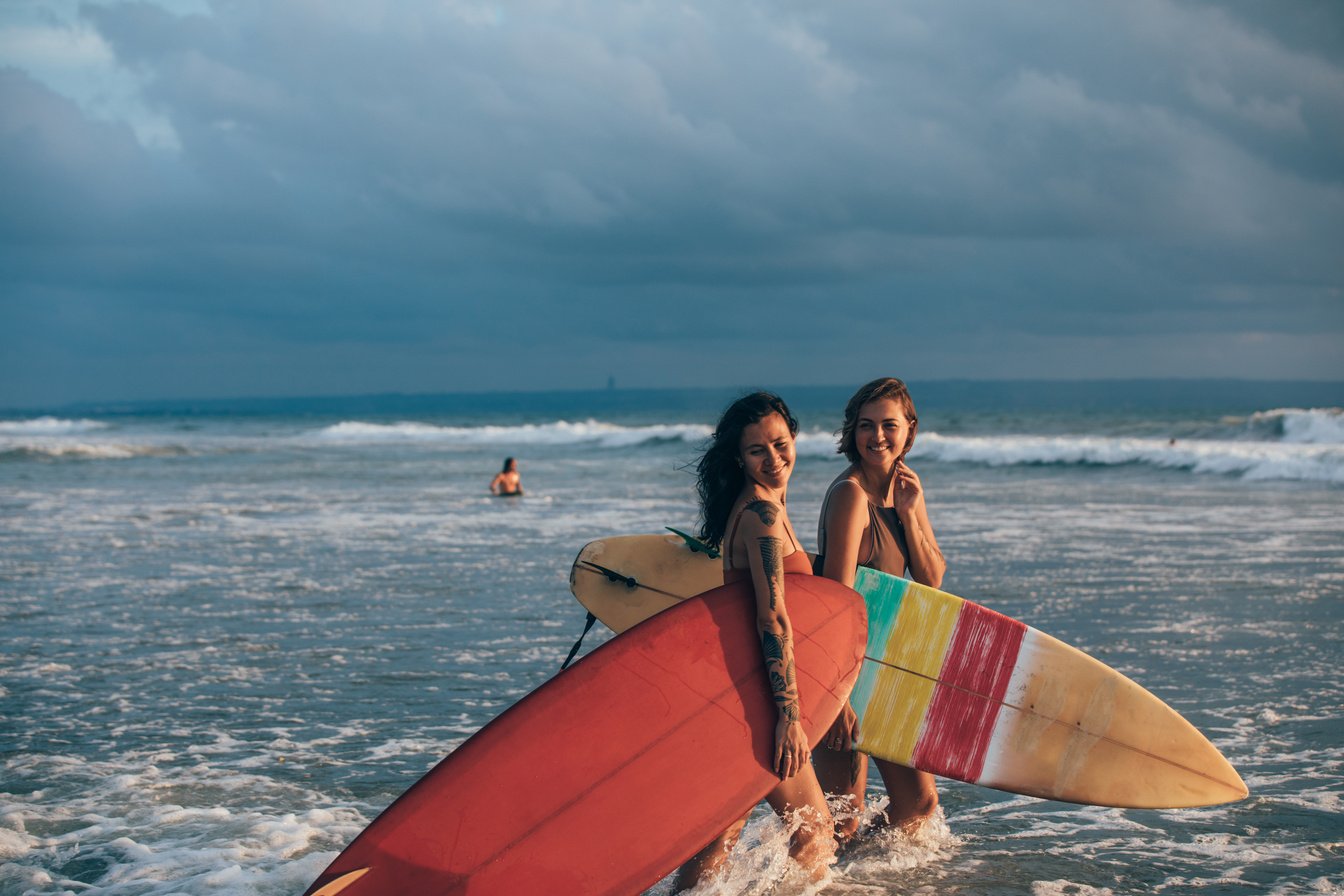 Girls going surfing